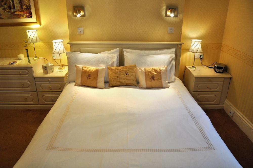Hotel Balincourt à Bornemouth Extérieur photo A bed with a duvet
